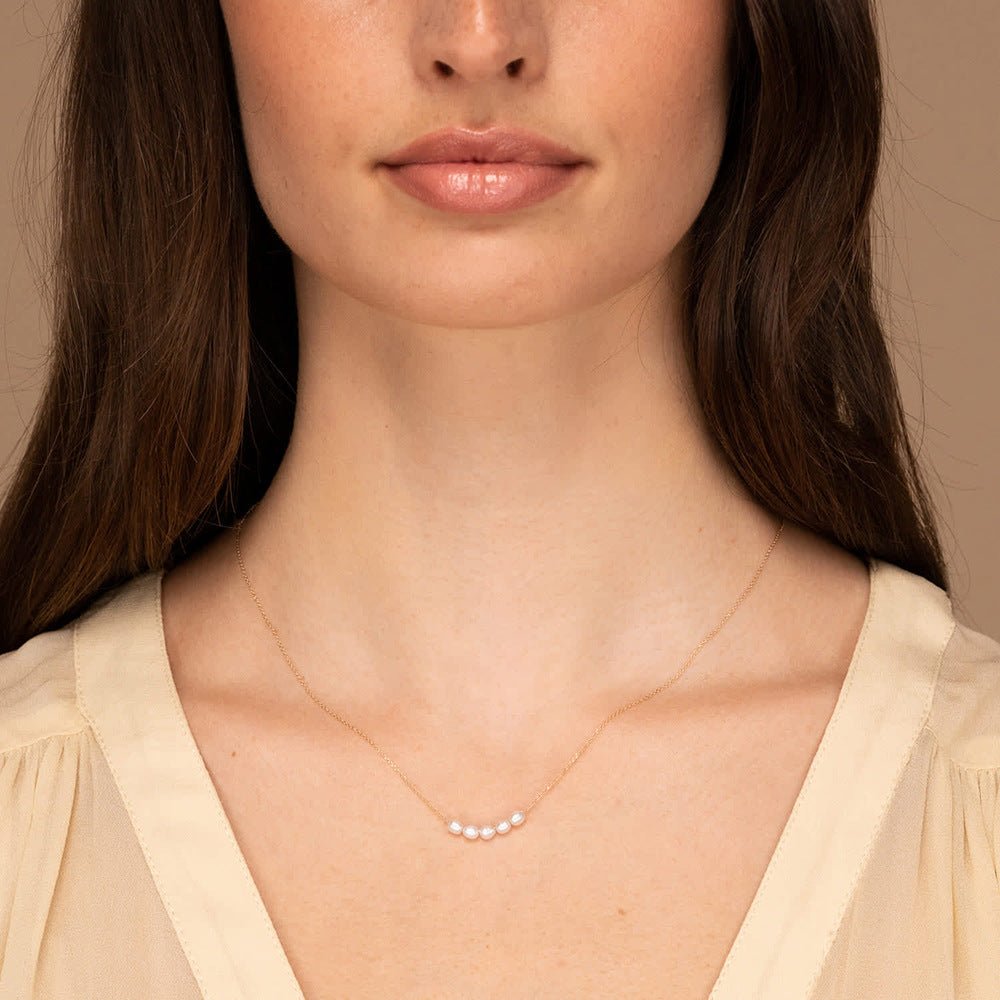 Collier en Perles d'Or Elle