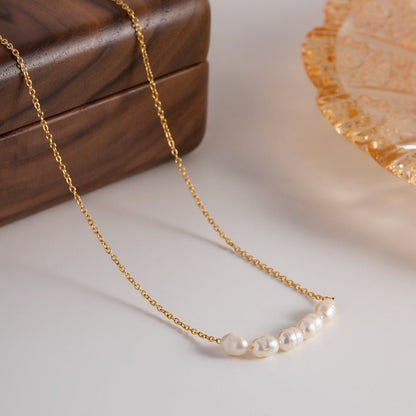 Collier en Perles d'Or Elle