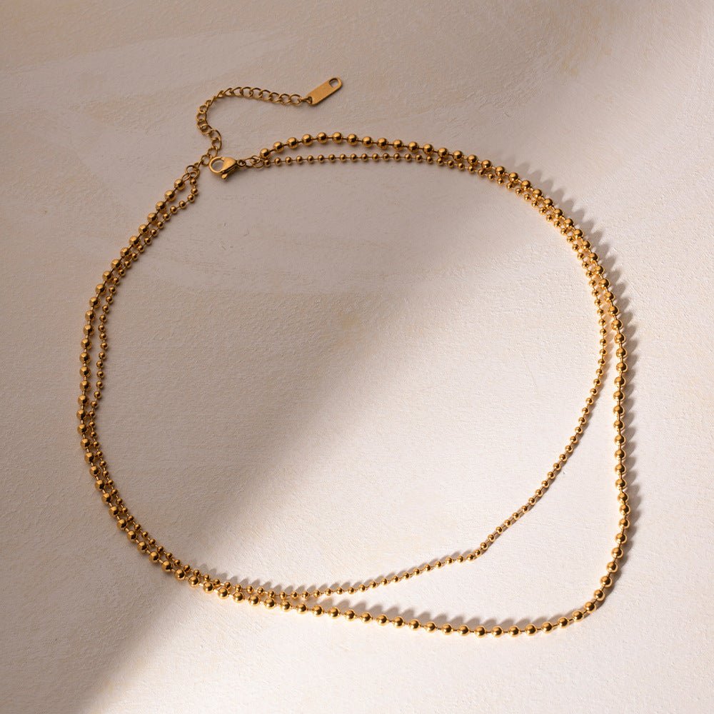 Collier en Chaîne à Boules Superposées