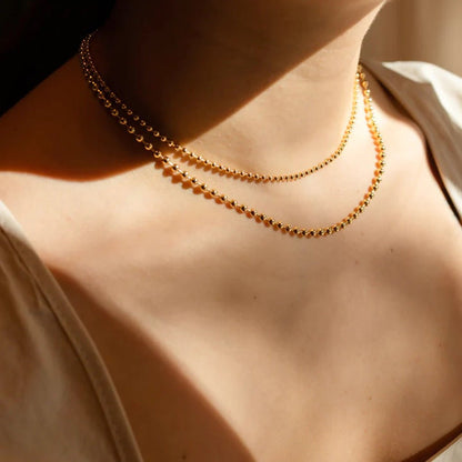 Collier en Chaîne à Boules Superposées