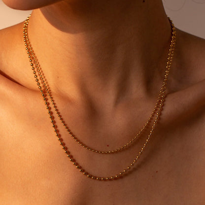 Collier en Chaîne à Boules Superposées